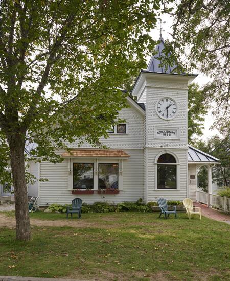 digitized image of The Cook Memorial Library, the public library of Tamworth, New Hampshire. The 1895 Queen Anne Victorian building began as a private "social library" established by Parson Samuel Hidden; the building was given to the village in memory of Charles Cook, a prominent local businessman and politician